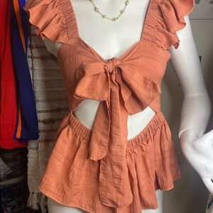 NWOT Super Cute Small blouse . Very unique Orange/Rust color